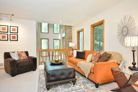 Luxurious leather ottoman for the comfy living room [Design: Lux-Living Homes]