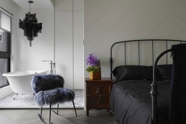 Master bedroom design with standalone bathtub in the corner