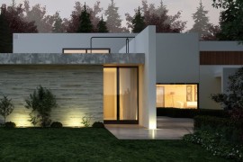 Modern home of stone, stucco and wood