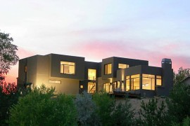 Modern stucco home with a boxy structure