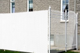 Privacy slats for a chain link fence