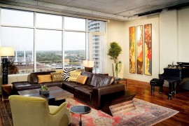 Right lighting lets the wall art standout with panache [Design: Cravotta Interiors]