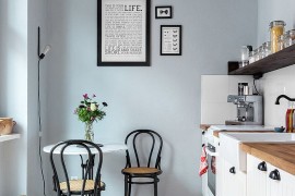 Small breakfast nook in the corner of the kitchen [Design: Kathy Kunz Interiors]