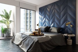 Smart bedside tables and Tom Dixon table lamps add glitter to the bedroom