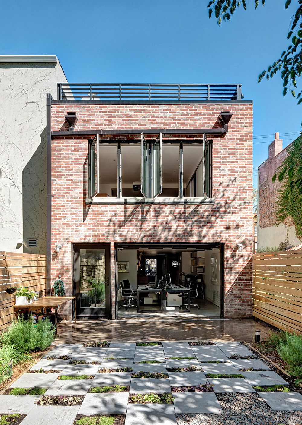 Weathered brick walls of the Brooklyn home gve it a timeless appeal