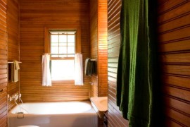 Serene bathroom with beadboard walls in wood