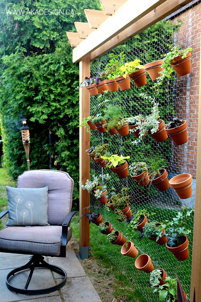 8 Space-Saving Vertical Herb Garden Ideas for Small Yards ...