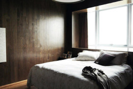 Stylish bedroom with a dark ambiance