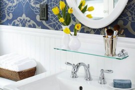 Lovely, sleek glass shelf above the sink