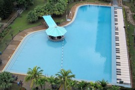 Elaborate design and carefully crafted details shape the piano shaped pool