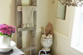 Wooden ladder adds a country feel to this shabby chic bathroom