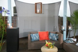 Shade sail used to create an outdoor lounge