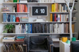Home office shelves turned into a standing desk