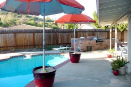 Umbrellas are a popular choice next to the pool