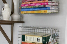 Baskets attached to walls as cookbook shelving