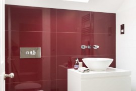 Bathroom with brown and red tile
