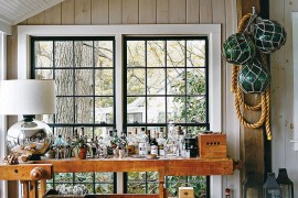 Beautiful bar on the rustic porch is all geared up for fun fall parties