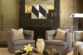 Coffee table brings geometric contrast to the elegant living space [Design: Kelly Wearstler Designs]