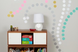 Colorful polka dot wall decals creating a design