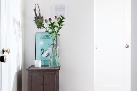 Compact table on a small entryway wall