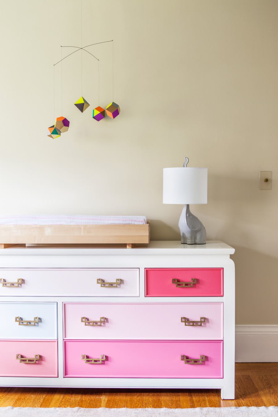 Dresser with painted drawer's in a child's bedroom