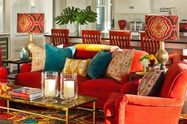 Eclectic living room that celebrates art and color! [Photography: Rikki Snyder]