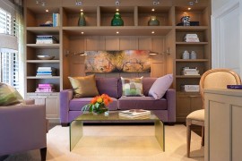 Fabulous sleeper sofa in purple and sconce lighting for the guest bedroom