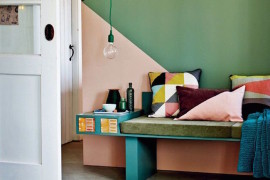 Geometric painted walls with accent pillows