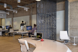 Giant Pixel reception desk with office view