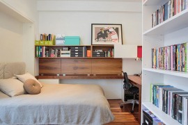 Guest bedroom and home office with ample shelf space