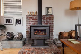 Interesting use of brick section for the fireplace [From: Ira Lippke / New York Times]