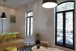 Large windows bring in sunlight and create an airy setting