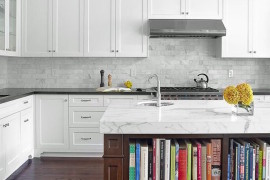 Library-style bookshelves built into kitchen island