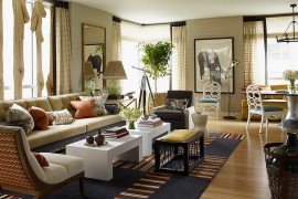 Living room looks less chaotic because of the uniform color scheme [Design: Thom Filicia]