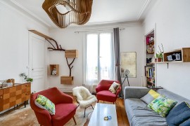 Living room of tiny Paris apartment with a style of its own
