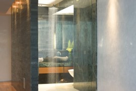 Luxury shower featuring green marble