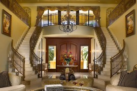 Mediterranean mansion with an entrance to remember clad in golden aura!