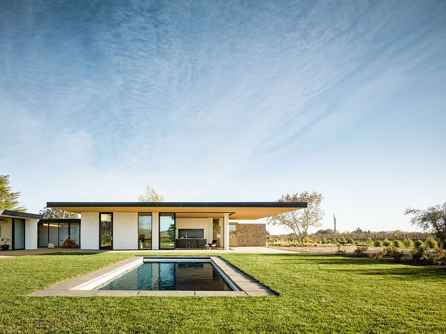 Natural vineyards and greenery surround the lovely California home