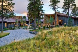 Natural walkways and canopy offer perfect cover for the relaxing Evergreen home