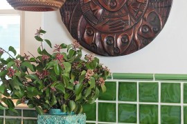 Original artwork adds to the appeal of the classy kitchen