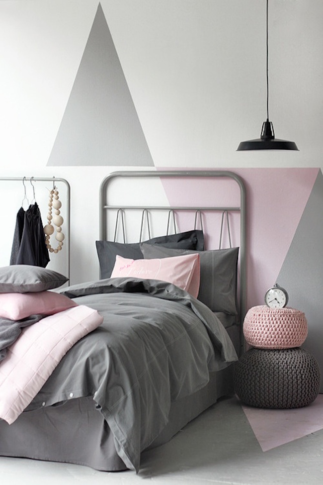 Pink and gray bedroom with triangular color blocking