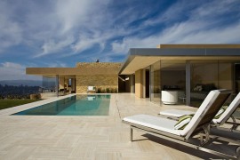 Private deck of the Posh Californian home with a tranquil pool