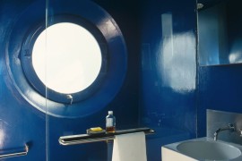 Shower with a porthole-style window