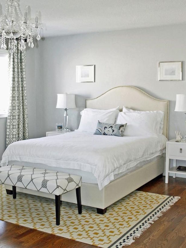 Simple yellow and white rug to brighten up a bedroom