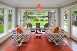 Twin Eames Wire Tables add to the style of the cool sunroom