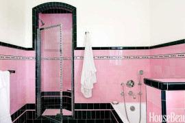 Very bold and retro bathroom in pink and black tile