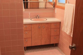 Very pink retro bathroom vanity