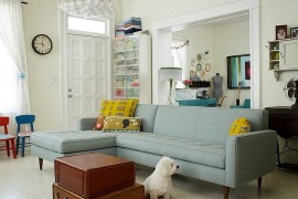 Vintage suitcases replace the traditional coffee table in this living room [Design: Renewal Design-Build]