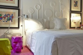 Wall art and unique headboard wall in the bedroom