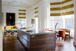 Window blinds bring stripes to this contemporary kitchen